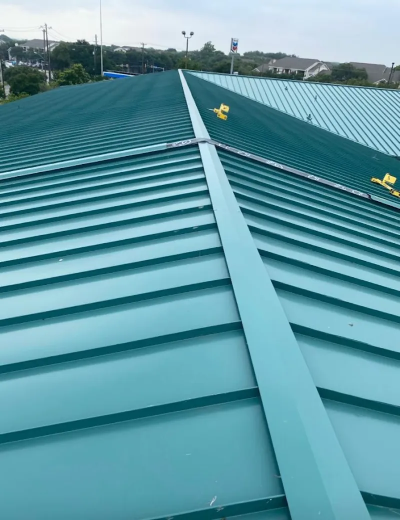 Green commercial metal roof ridge and valley for Metal Roof Repair in Mantua