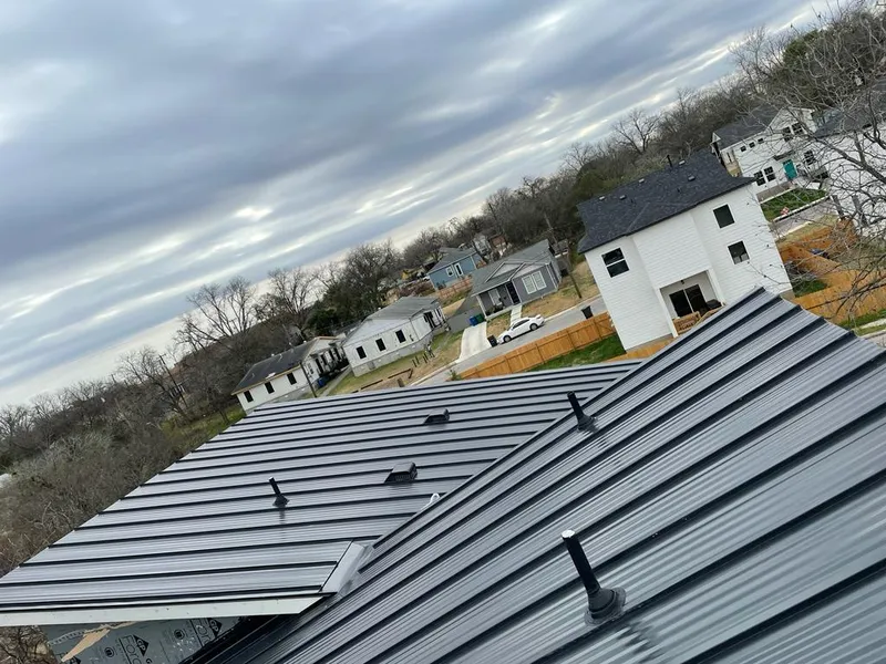 Standing seam metal roof panels with vents for Skylight Repair in Mantua